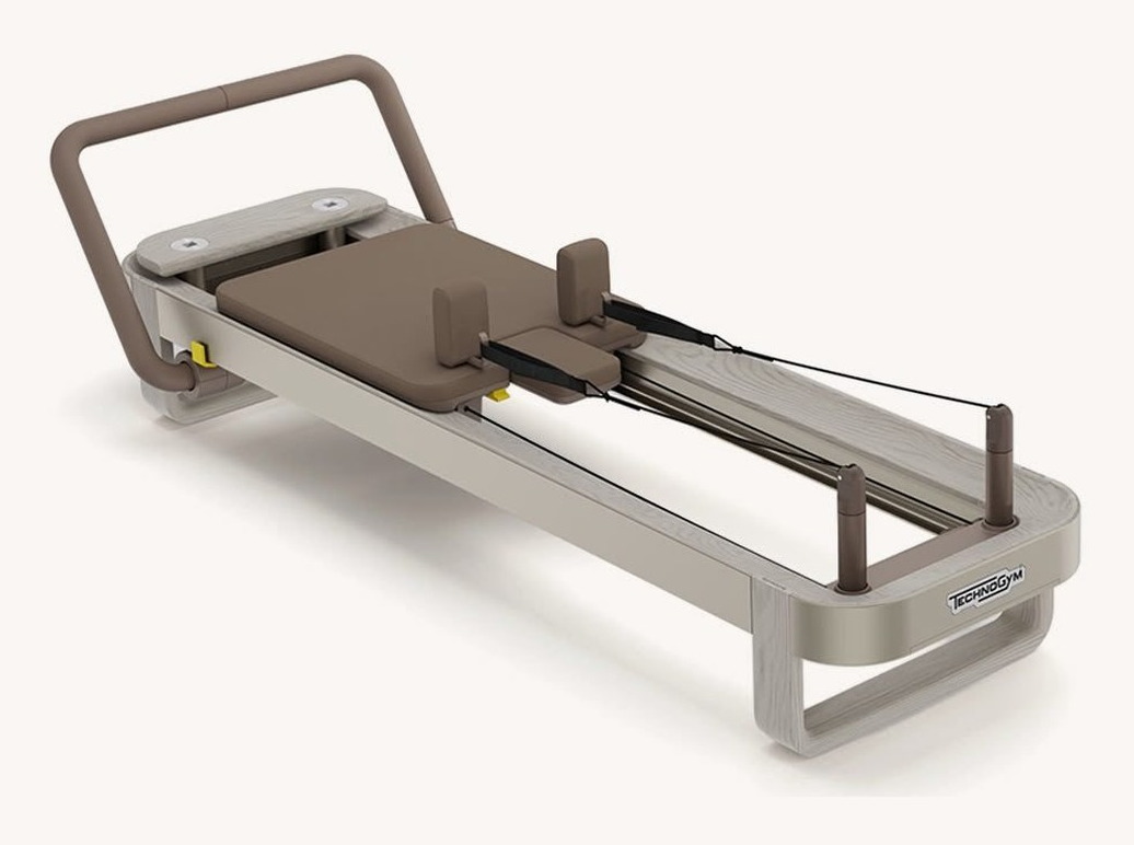 A Technogym Reform reformer, the machine used in every APEX pilates class